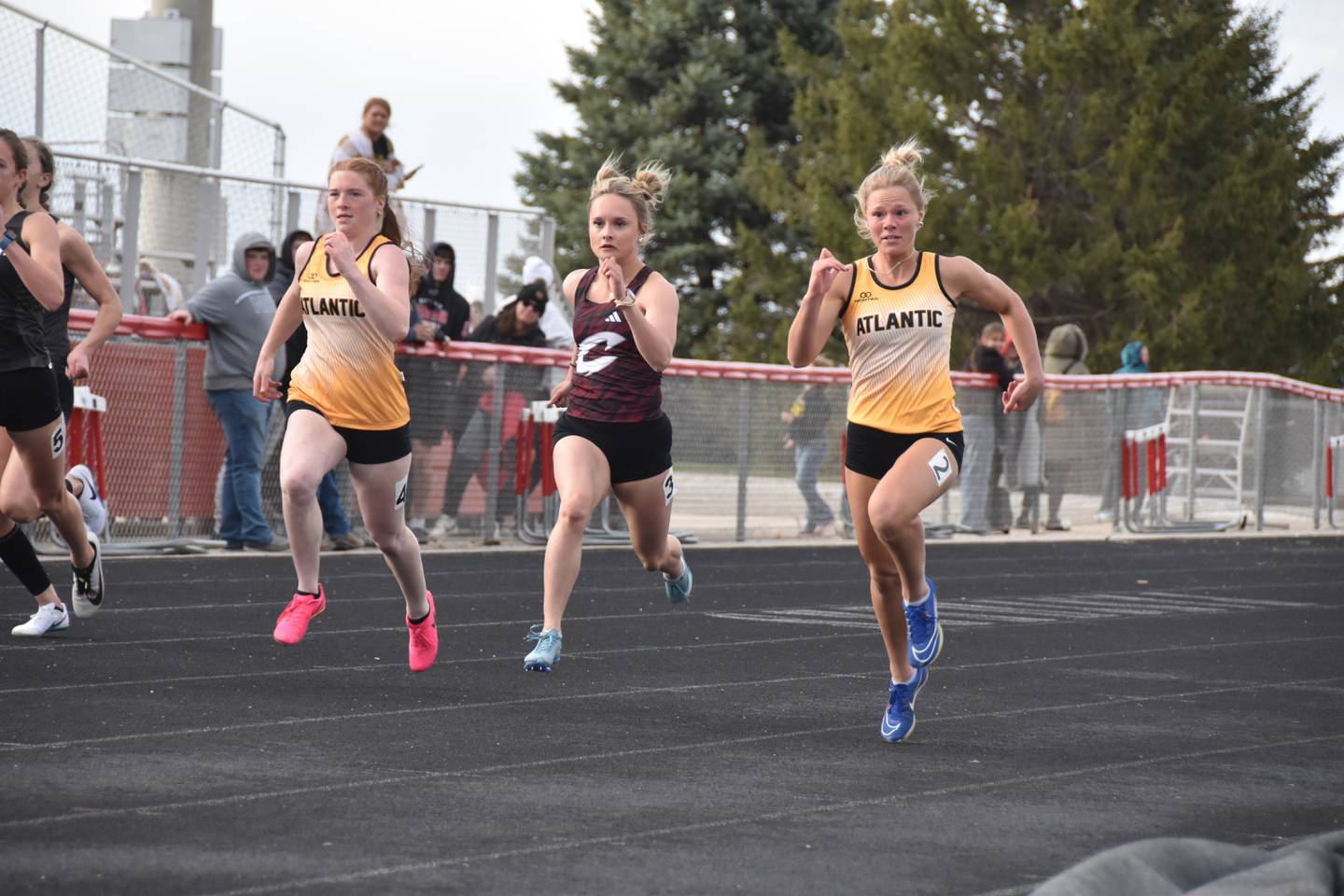 Kya Thornton runs in the 100-meter dash at Creston on April 14.
