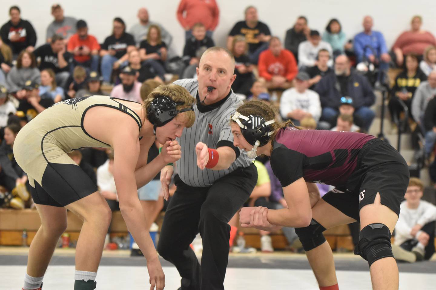 Uriah Fry faces off against Creston’s Austin Evans in the 144 lbs finals Saturday in Corning at the 69th annual John J. Harris tournament. Evans pinned Fry with only five seconds remaining in the first period to win the title