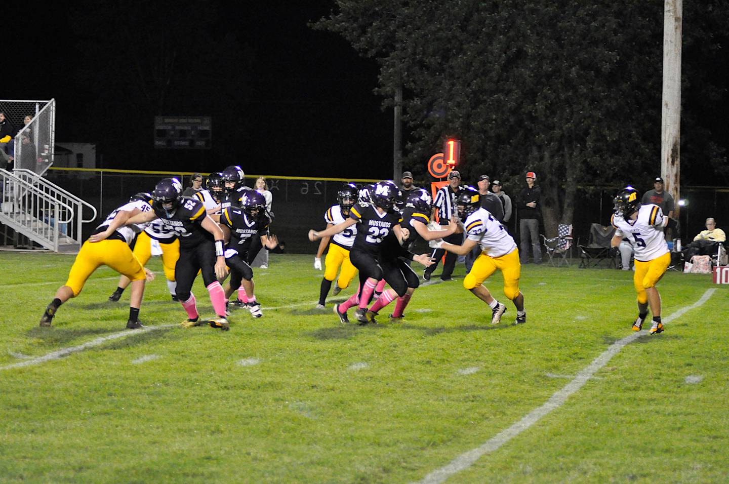 Murray offense blocks Mormon Trail defense as Keegan Chew runs the ball.