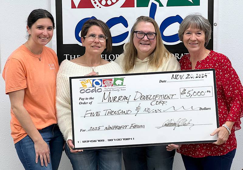 Members of Murray Development Corp. accept their $5,000 award. Pictured from left to right: Kristin Flaherty, Crissi Tracy, Rhonda Carmi, Diana Moffitt-Robins.