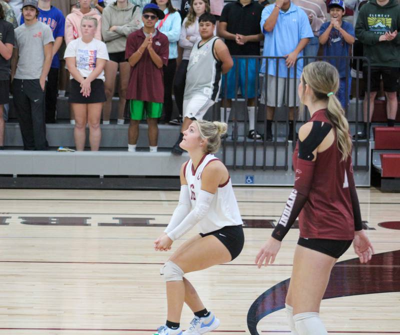 Josie Moore waits to bump the volleyball at Clarke's home game against Knoxville.