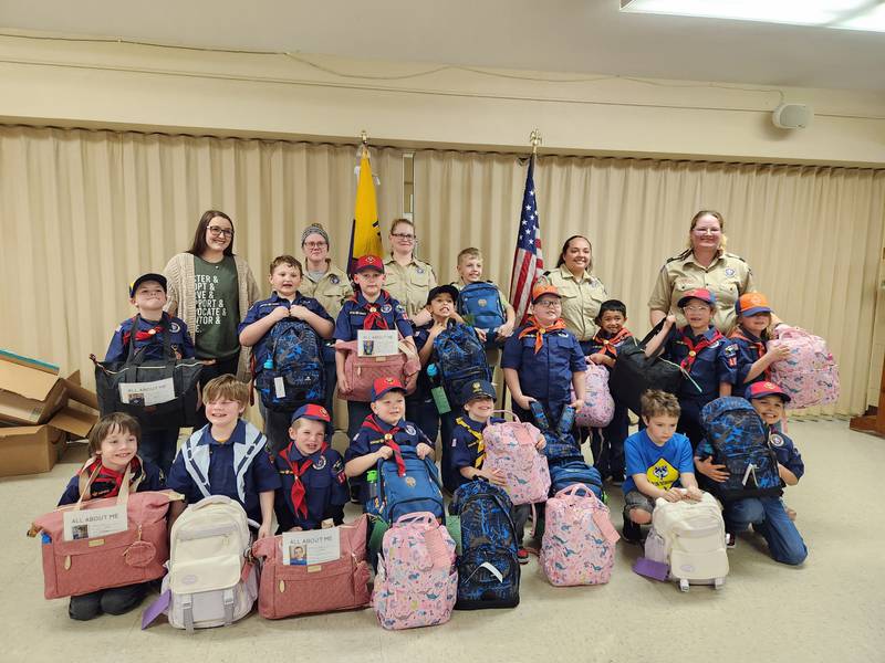 Clarke County Cub Scouts Pack 101 with their finished backpack project. Front row l-r: Shane Langille, William Langille, Logan Nelson, Dylan Hogberg, Baker Nelson, Isaac Duncan and Liam Roberts; second row: Oliver White, Jaxson Toney, Landon Gaumer, Jayden Roberts, AJ Wilson, Bryan Hernandez, Coral Gutierrez and Lydia Mason; third row: Emma Krall (from Four Oaks), Taylor Wilson, Katie White, Chase LaMastres, April Hernandez and Jewel Hogberg. Not pictured: Lyndsey Toney, Zander Black, Blake Davis, Kolby Davis and Maverick Davis.
