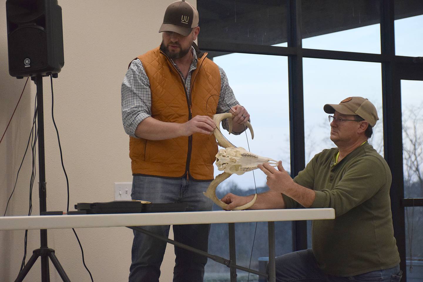 Taaffe Caligiuri shows measuring the main beam with assistance from Scott Kent.