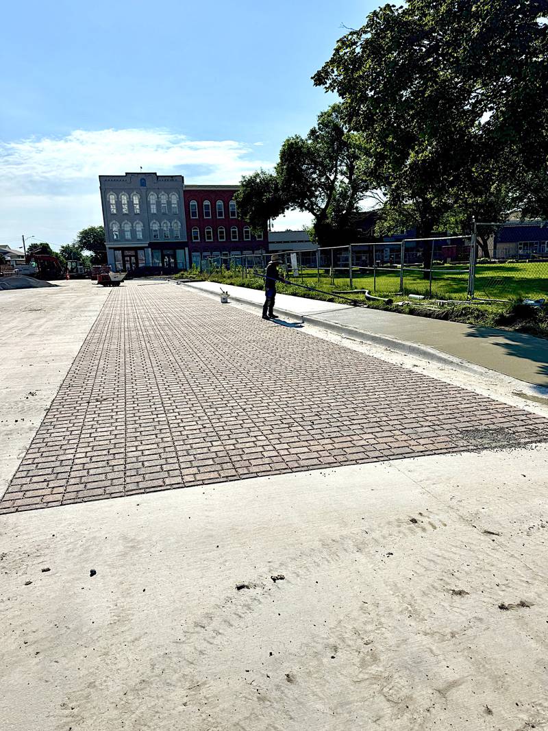 All of the pavers are in on both sides of West Washington Street.