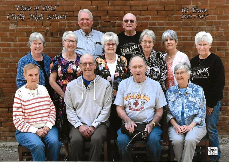 Clarke High School Class of 1962. Front row l – r: Martha (Young) Wade, Weldon; Richard Mongar, Humeston; Jack Ellis, Urbandale; Sue (Spencer) Keeler, Weldon. Second row, l - r Diane (Estes) Olsen, Cedar Rapids; Karen (Ford) Smith, Frederick, Colorado; Royanna (Hukill) Spencer, Osceola; Marie (Gardner) White, Osceola; Marie (Freeman) Glafka, Bend, Oregon; Kathi (Williamson) (Hainline), Leon. Back row l – r: Jeff Wade, Weldon; Roger Hickman, Raymore, Missouri.