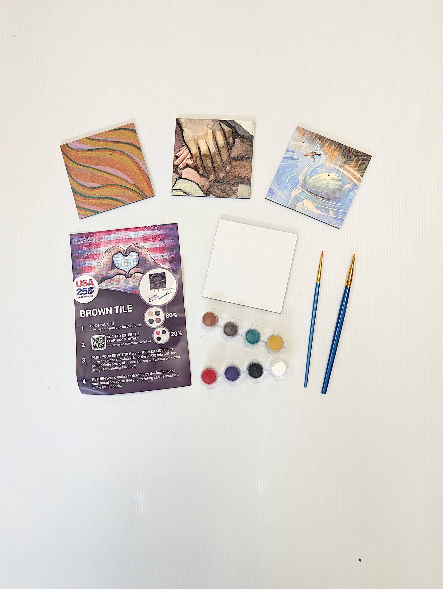 Example of painted tiles and tile kit.