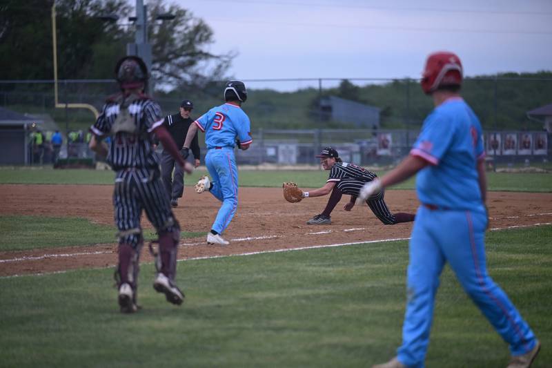Clarke's Ethan Danley reaches for the ball at the home game against Central Decatur May 20.