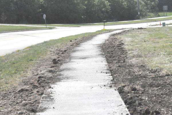 Council amends sidewalk  program incentive