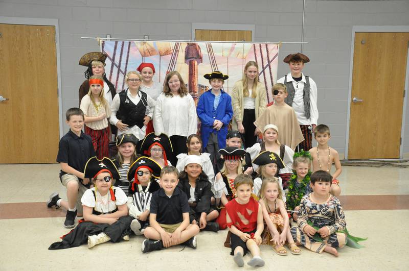 Members of the Osceola Children’s Theatre at their dress rehearsal for ‘Treasure Island.’ Left to right, first row sitting: Brecken Porter, Anson Audlehelm, Killeean Thornton, Quinn Keller; second row sitting: Aubrie Cross, Cameron Lampe, Jessa Navas, Landry Readout, Keera Thornton, Paisley Lampe; third row kneeling: Jayden Lampe, Timber Page, Addilyn Cross, Ebony Lenz, Sutton Jones, Rowan Keller, Mason Wells; fourth row standing: Hali Nelsen, Collins Readout, Jocelyn Moomey, Bentley Barton, Luke Readout; fifth row standing: Haydon Brokaw, Brynnley Porter, Aubrey Nissen, Ryder Page