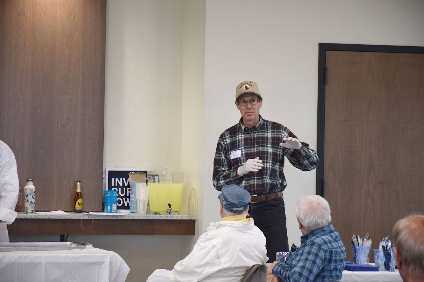 Former director of the Iowa Farm Service Agency Matt Russell talks in Osceola on April 3.