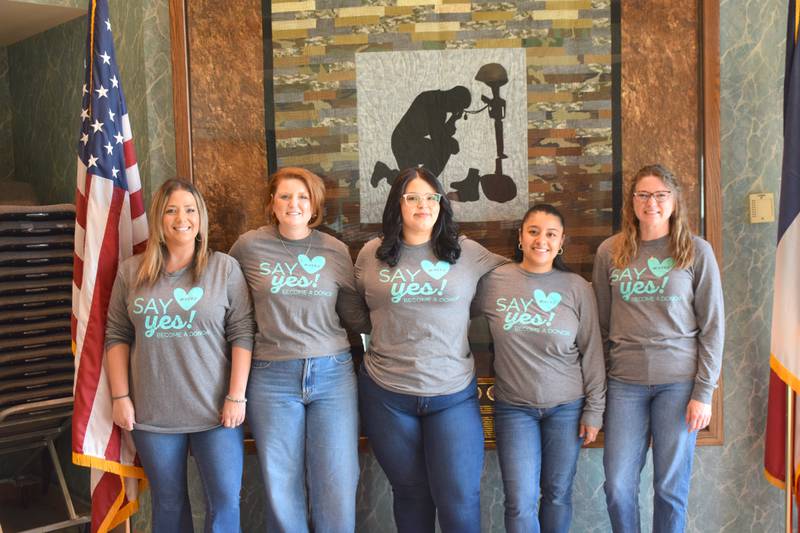 Members of the Clarke County Treasurer’s Office “Say Yes” to organ donation in honor of National Donation Month. From left: first deputy treasurer  Brooke Caldwell, Clarke County Treasurer Jessica Smith, driver’s license examiner Esmeralda Elizondo, motor vehicle deputy Sandra Ramos and motor vehicle deputy Shelby Hawxby.