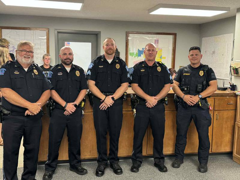 Three Osceola patrol officers were promoted July 15 to the ranks of sergeant. From left, Osceola Police Chief Marty Duffus, patrol sergeant Tyson Rumley, detective sergeant Cody Smith, patrol sergeant Garry Potter and Osceola Police Captain Curt Jacobsen.