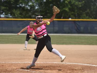 Clarke softball split games at Creston