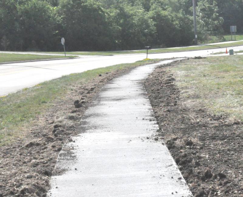 A sidewalk on West Clay Street was added in by the city. Private owners can take advantage of a funding program through the city if they install or replace their sidewalks.