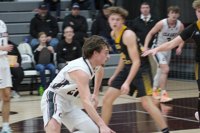 Brock Nall drives around Eddyville-Blakesburg-Fremont defense at Clarke’s home game against EBF on Jan. 28.