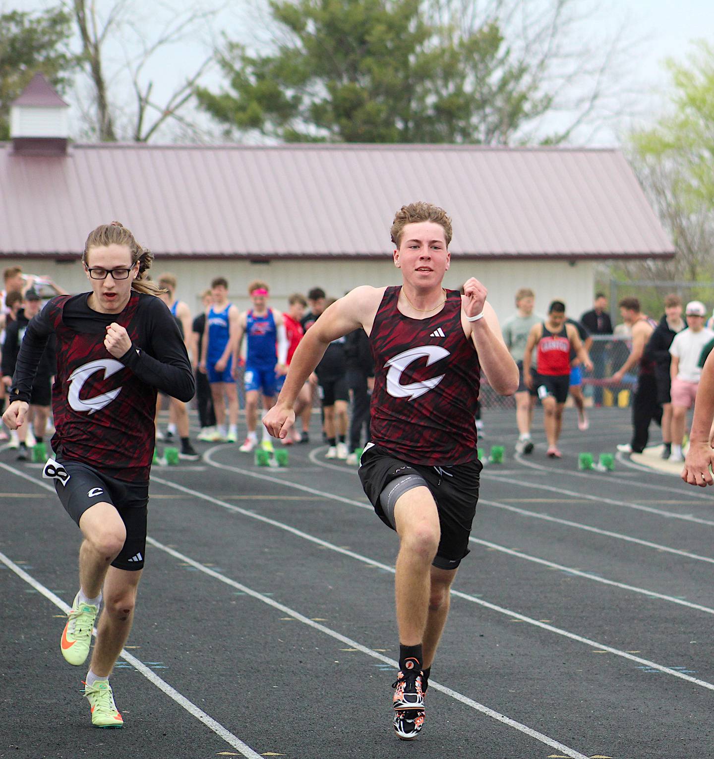 Cayden Anderson and Ethan Danley run in the 100m dash at home on April 17, 2025.