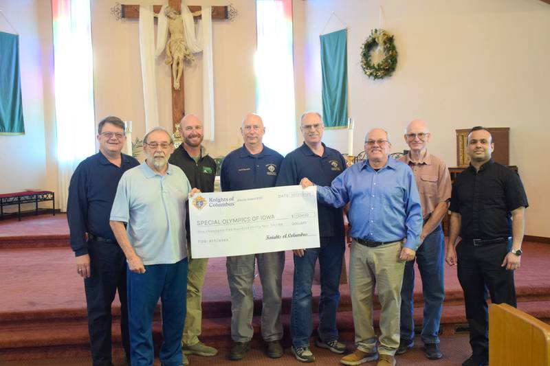 Members of the St. Bernards Council 8702 of the Knights of Columbus present a check in the amount of $1,534.50 to the local Special Olympics Iowa. Pictured from left to right are: Knights of Columbus member Michael Evink, Clarke/Murray Schools Special Olympics Iowa coach Michael Peterson, Knights of Columbus member Ryan Rychnovsky, Kevin Seuferer, Jay Haumersen, Grand Knight John Kooiker, Jason Ramsey and Father Tomson Thomas.