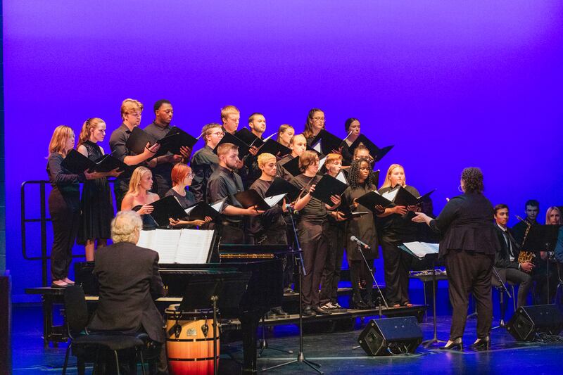 Graceland University choir and choir conductor Lauren Clark