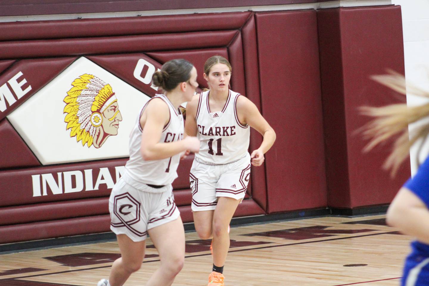 Reese Shaw, #11, and Reagan Fry, #1, head back down the court.