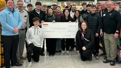 Osceola Hy-Vee donates $2,000  to Clarke bowling team